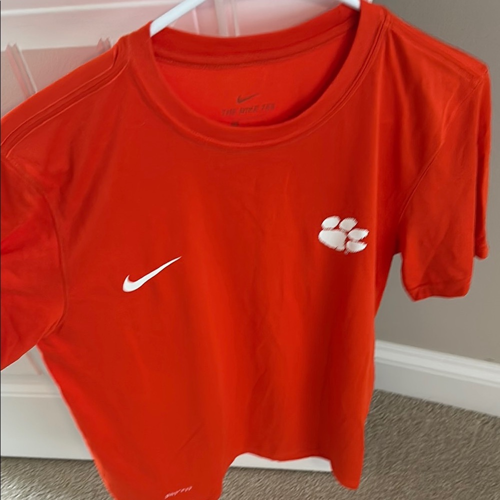 Nike womens Orange Short-Sleeve Athletic Tee with Paw Logo
